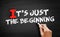 It`s Just The Beginning text on blackboard