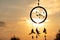 It`s a native American dream catcher and golden rays of the sunset