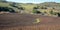 S shaped irrigation ditch in plowed field in Central California near Guadalupe California USA