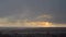 It`s starting to rain. Sunset, city, clouds, downpour. Rainy cyclone