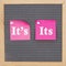 It`s or it on two sticky note on gray felt letter board