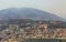 Sa Pa landscape with city, mountains, fog and trees the view from above from Sam Bay Cloud Yard in summer at Ham Rong Mountain.