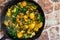 Saag Aloo, Indian style spinach and potatoes in cast iron pan