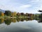 Saalfelden ritzensee with still reflecting water colorfull autumn trees