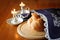 Sabbath image. challah bread and candelas on wooden table