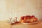 Sabbath image. challah bread and candelas on wooden table