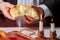 Sabbath kiddush ceremony composition with two candles and a traditional sweet fresh challah bread
