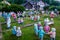 Sabile, Latvia - July 12, 2018: Garden full of puppets dressed up as singers, policemen, sportsmen, families etc.