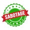 SABOTAGE text on red green ribbon stamp