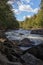 The Sacandaga River with expansive blue sky in Upstate New York.