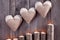 Sackcloth handmade hearts with lace candles illuminated from be