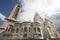 Sacre Coeur Basilica Church with Blue cloudy sky Backgrounds at Montmartre Hill, Paris France, White stone church