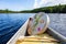 Sacred drum and fur covered stick on canoe