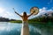 Sacred drum player in mountain landscape