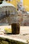 Sacred incense, religion offering in traditional balinese temple of Lempuyang on Bali, vertical. Incense sticks smoke, bascket.