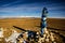 Sacred place with obo. Winter landscape of Mongolia. Lake Khubsugul and mountain