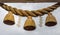 Sacred rope, shimenawa, and zigzag streamers, shide, on torii gate to small local shinto shrine, Kumagawa, Japan