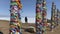 Sacred serge pillars near Shamanka, Cape Burkhan. Colorful Tibetan Buddhist ribbons
