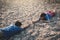 Sad Asian children tired and exhausted on cracked dry ground