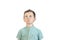 A sad boy with a crooked mouth in a green shirt looks up somewhere. A beautiful child with a sad expression. White background. Iso