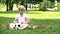 Sad boy sitting lonely in park, playing with football alone, bullying problem