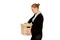 Sad business woman carrying box after loosing job