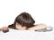 Sad caucasian child kid girl sister lying on the bed with mobile phone and tablet pc isolated