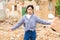 Sad chinese woman and destroyed house after earthquake