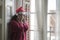 Sad Christmas home alone during covid19 - young beautiful and depressed Asian Chinese woman in Santa Claus hat looking melancholic