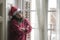 Sad Christmas home alone during covid19 - young beautiful and depressed Asian Chinese woman in Santa Claus hat looking melancholic