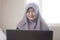 Sad Crying Muslim Businesswoman to See Bad Financial Loss Report on Laptop