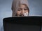 Sad Crying Muslim Businesswoman to See Bad Financial Loss Report on Laptop