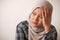 Sad depressed anxiety Asian muslim woman thinking contemplating bad thing happened in her life, stress exhausted feeling down