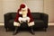 Sad and depressed Santa Claus waiting for christmas job