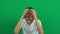 Sad disappointed teenage boy shaking his head in disbelief. Something bad has happened. Green screen chroma key