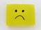 Sad expression. Simple yellow note