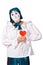 Sad female mime clown with a red heart