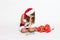 Sad girl in Santa Claus costume with inappropriate gift