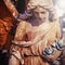 Sad guardian angel. Fragment of an beautiful antique statue