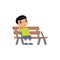 Sad little asian boy. Unhappy child sitting on bench. Lonely boy is bored in the playground.