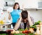 Sad man with angry wife at kitchen