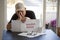 Sad man with cap looking at Eviction Note