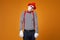 Sad mime in vest and red hat Isolated