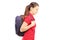 Sad schoolgirl with a bag walking