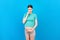 Sad and stressed pregnant woman isolated on colored background