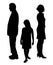Sad unhappy child standing between two divorcing parents