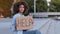 Sad upset stressed african american woman with curly hair afro distressed lady female frustrated girl sitting outdoors