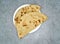 Sada tandoori roti in white plate pakistani food top view on grey background