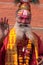 Sadhu man waves a blessing over crowd-
