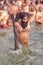 A sadhu manages his long hair at the Kumbh Mela main bathing day 04 February 2019